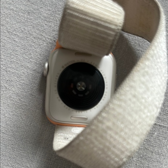 Smartwatch with Cream Band and Charger - Picture 2 of 4